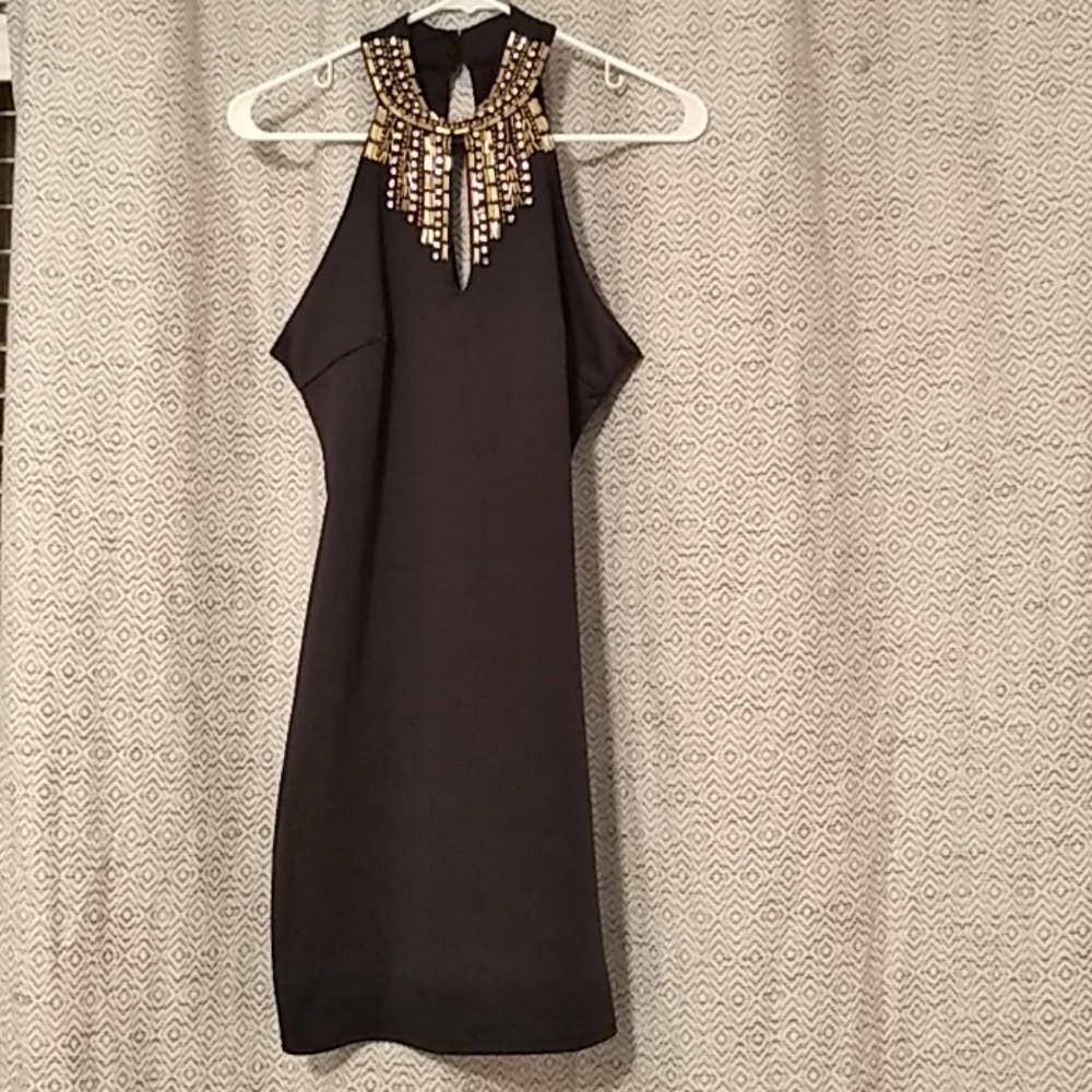 High neck dress with gold accents